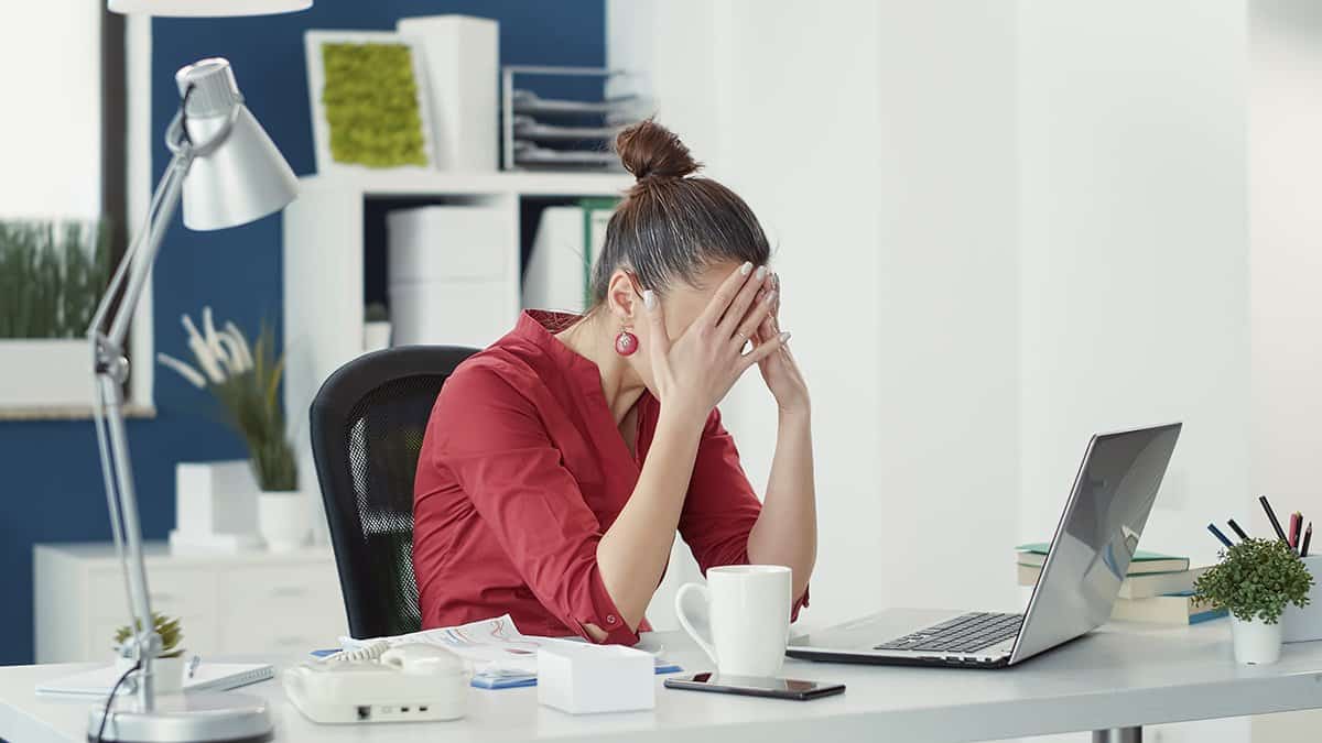 Stressed employee making mistake at office startup job